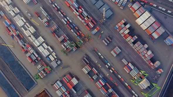 Aerial View of the Port Cargo Area with Containers Bulk Cargo Cranes Trucks