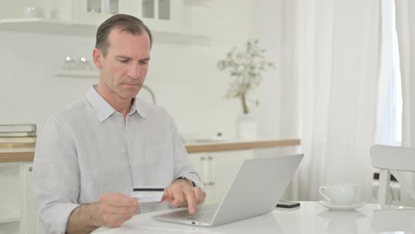 Middle Aged Man with Online Payment Failure on Smartphone