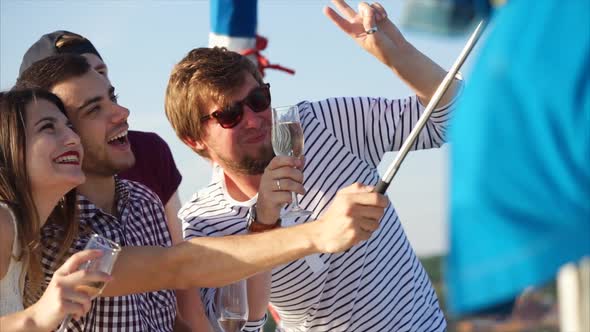 Happy Friends Making Selfie During Party on the Yacht