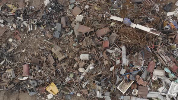 Scrapyard with Rusty Metal Scrap Pile