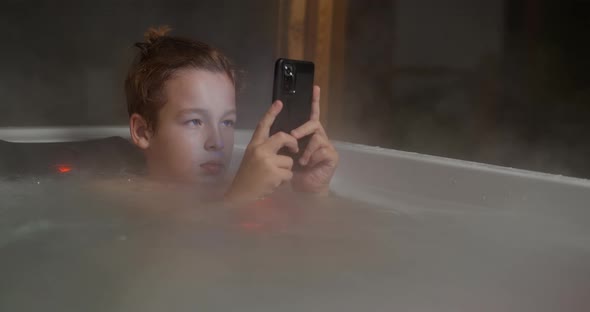 Boy in Outdoor Bathroom