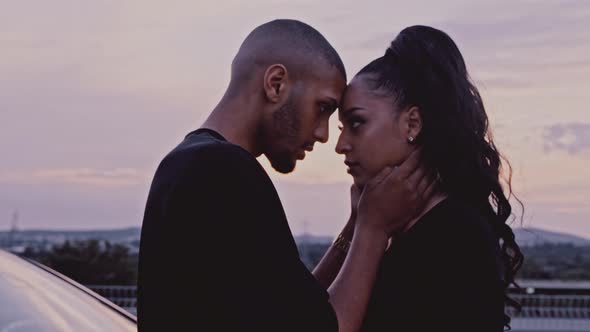 Black Couple looking at each other