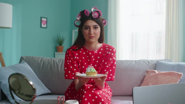 Portrait of Beautiful Woman with Cake on Plate