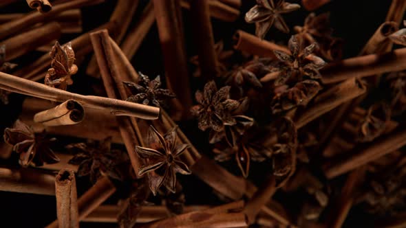 Super Slow Motion Shot of Cinnamon and Star Anise Explosion on Black Background at 1000Fps