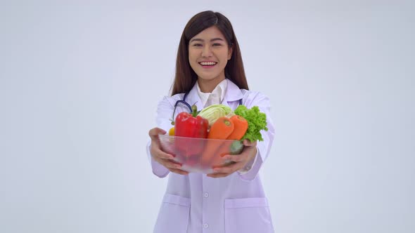 Doctor or nutritionist holding fresh fruit