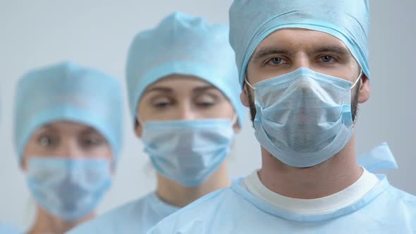 Professional Doctors in Uniform Looking Camera, Qualified Medical Team, Surgery