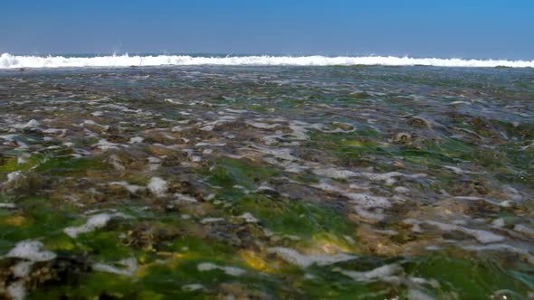 Tremendous Foaming Ocean Waves Roll on Coastline Slow Motion