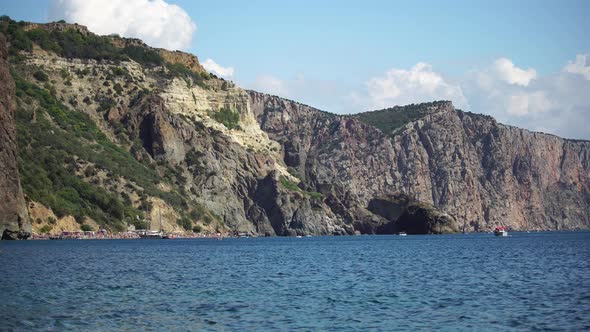 Sea Landscape with Yachts and Rocky Coastline