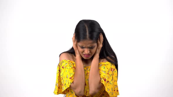 Stressed Indian girl about to cry