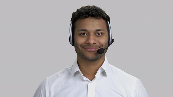 Close Up Portrait of Happy Darkskinned Man Wearing Headset