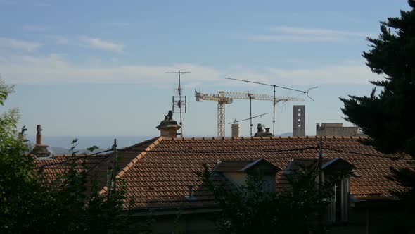 Towers, antennas and a crane in Grasse