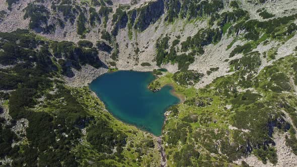 Aerial View of a Lake in the Pirin Mountains with Blue Clear Water