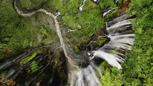 Drone Directly Over Edge Of Tumpak Sewu Waterfalls
