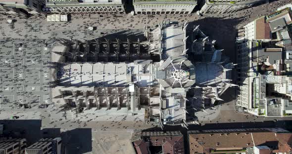 Top-down aerial view of iconic Milan Cathedral and Piazza Duomo, Italy