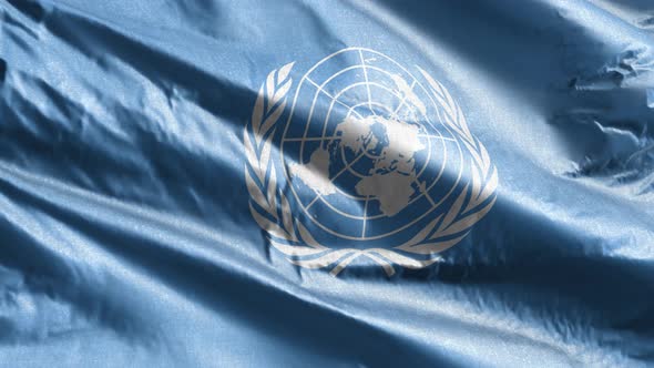 UN - United Nations textile flag slow waving on the wind loop