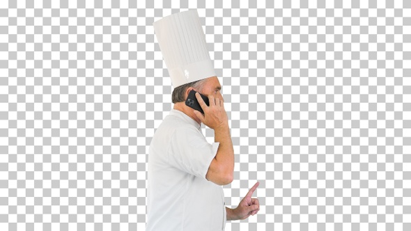 Chef speaking on the phone while walking, Alpha Channel