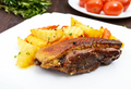 Roast goose breast fillet with potatoes country style on a white plate. - PhotoDune Item for Sale