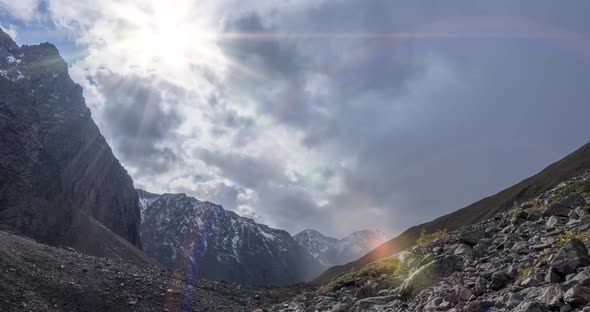 Timelapse of Epic Clouds in Mountain Valley at Summer or Autumn Time. Wild Endless Nature and Snow