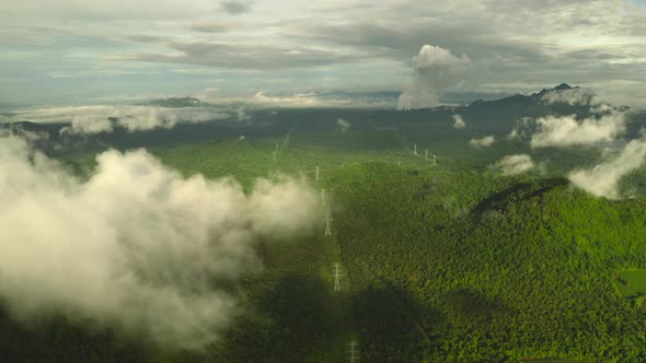 Aerial view Morning scenic on high mountains with electricity pylon.