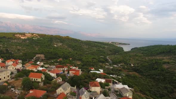 Aerial view of a small village by the hillside in Sumartin Brac Island Croatia