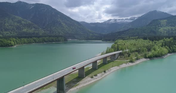 Bridge over mountain lake reservoir, Sylvenstein, Bavaria, Germany