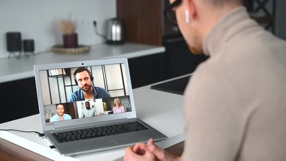 Young Business Man in Glasses Has Video Call