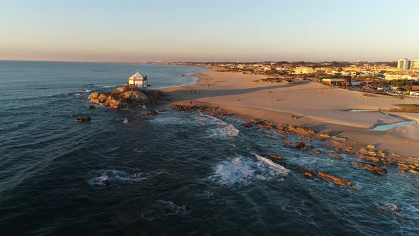 Fly Above Church and Beach of Senhor da Pedra in Espinho, Portugal