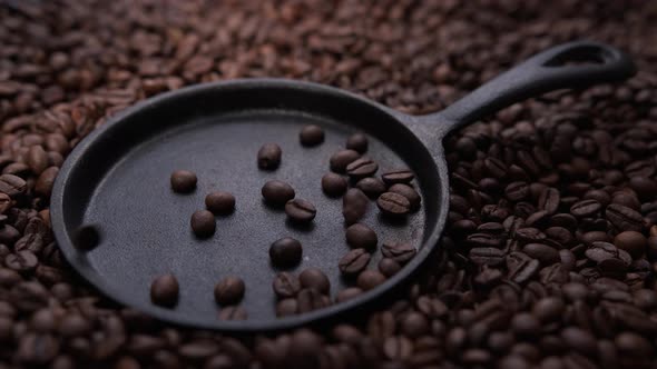 coffee beans fall into the pan