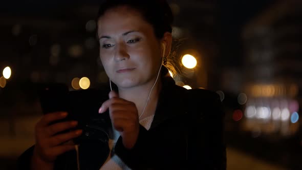 Cute Girl Browses the Internet on Your Phone