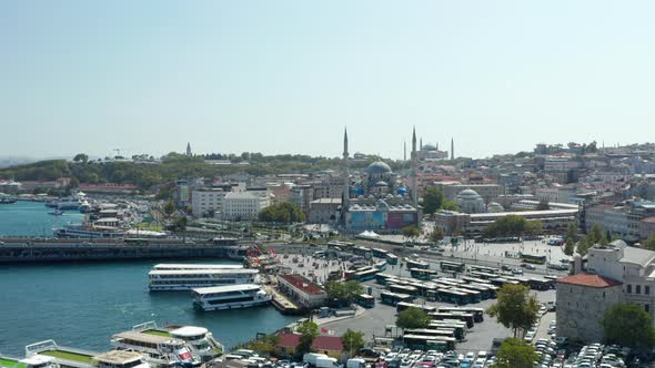 Rush Hour at Grand Bazaar in Istanbul with Bus and Cars and Mosque on a Hill, Slow Aerial Drone