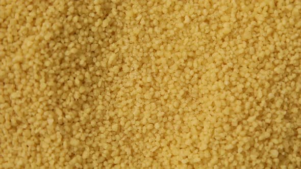 Rotation raw dry couscous groats, cereals