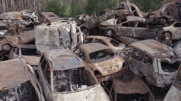 War in Ukraine a Dump of Burned Cars in Irpin Bucha District