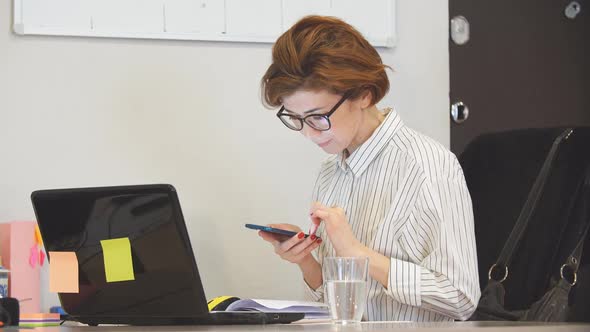 Tired Woman Working Late, Using Laptop. Technology and Overworking Concept