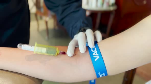 Medical Check Up Blood Test Extracting Sample Pulling Needles Out