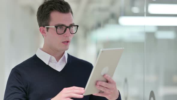 Young Businessman Doing Video Call on Digital Tablet 