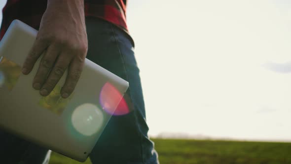 Smart Agriculture Technology Farmer Holding Tablet with Smart Technology