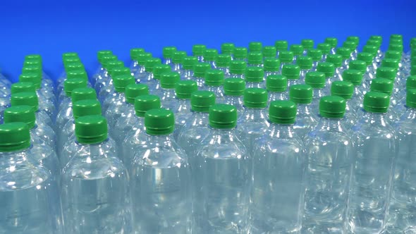 Passing Rows Of Spring Water Bottles