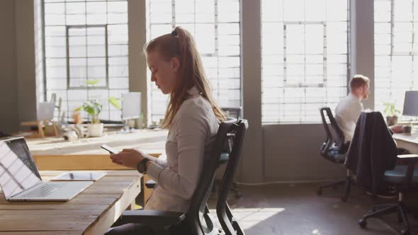 Young creative professionals working in a modern office