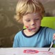 Young Boy Is Painting On White Paper - VideoHive Item for Sale