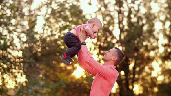 Father Throws Up Son on Nature