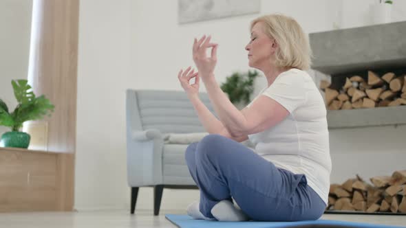 Close Up of Healthy Senior Old Woman Doing Exercise on Yoga Mat