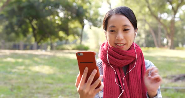 Woman Making Video Live Stream on Cellphone