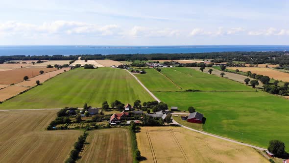 Drone view over fields on Öland, Sweden. Flying up and forward part2