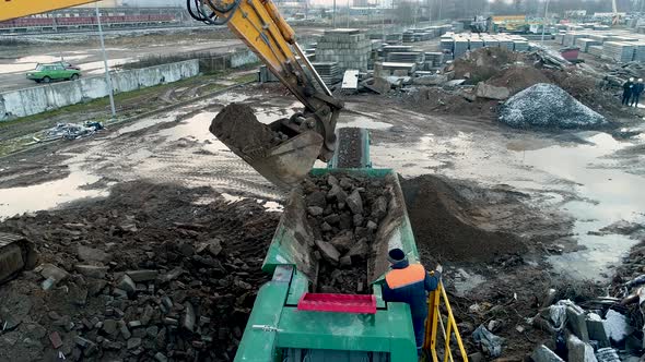 Industrial Recycling of Concrete Heavy Construction Equipment: Excavator, Concrete Crushing Station