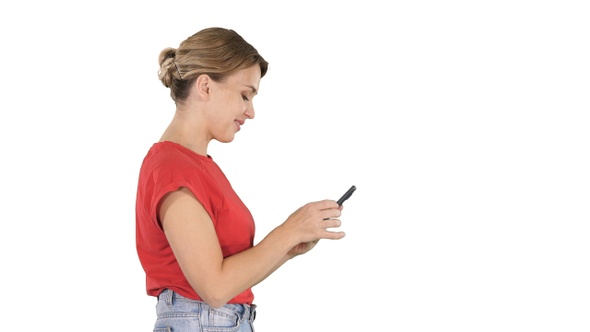 Pretty woman using cell phone on white background.
