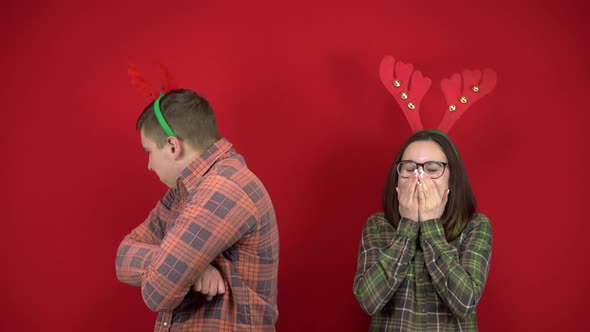 The Young Woman Laughs at the Young Man Because He Has Small Horns and the Man Is Offended Against