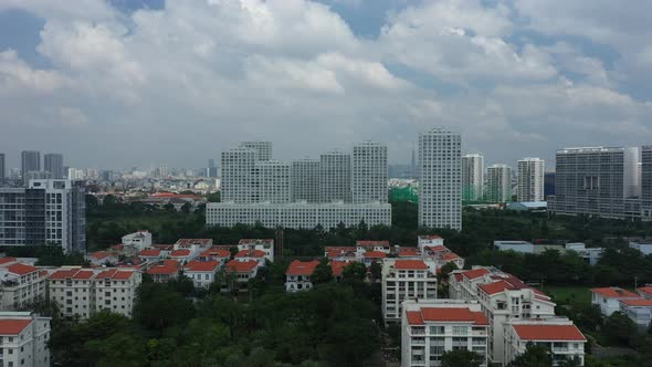 Ultra modern city development with residential and commercial high rise buildings, villas, green spa