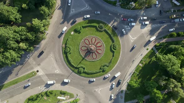  Aerial View of Roundabout Road with Circular Cars in Small European City at Sunny Day