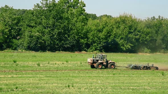 Tractor Preparing Land