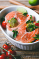 Fresh salmon steaks with lime, cherry tomatoes, parsley and olive oil. - PhotoDune Item for Sale